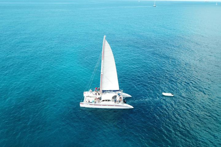 a small boat in a large body of water